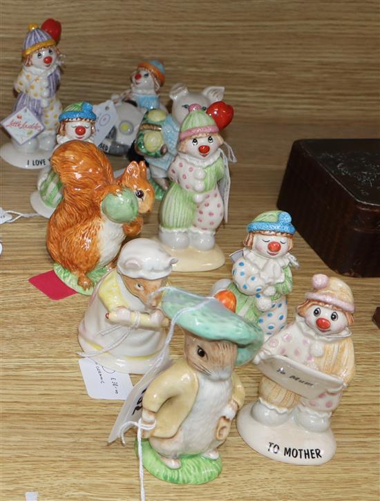 A collection of mixed Royal Albert and Beswick clowns and animals (10)